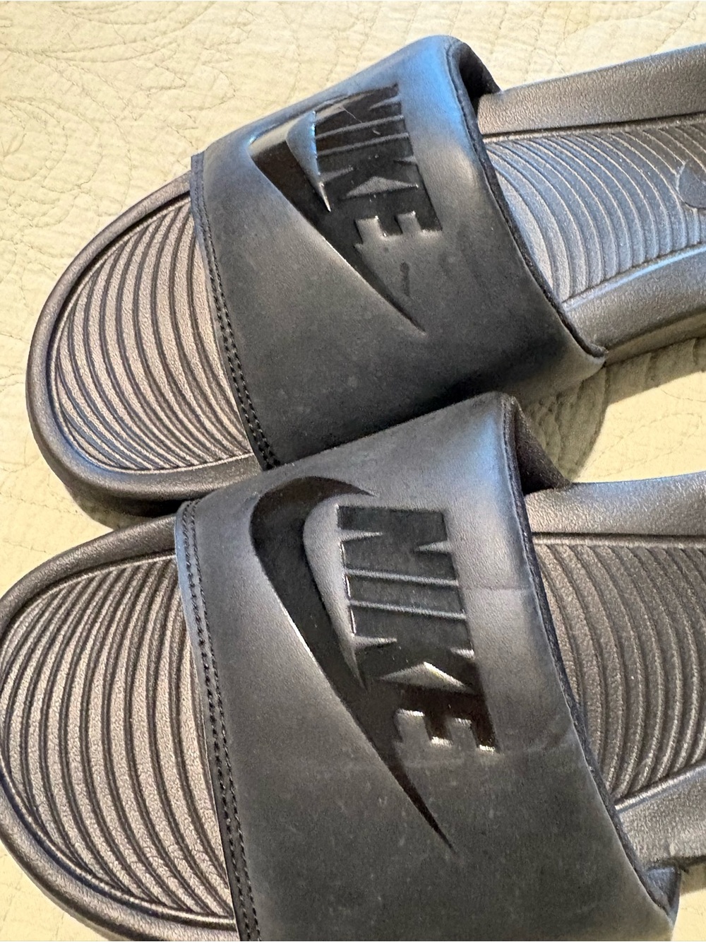 Nike Men’s Black Slide Sandals with Embossed Logo
